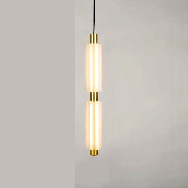 Linea modern long acrylic pendant light as bedside lighting.