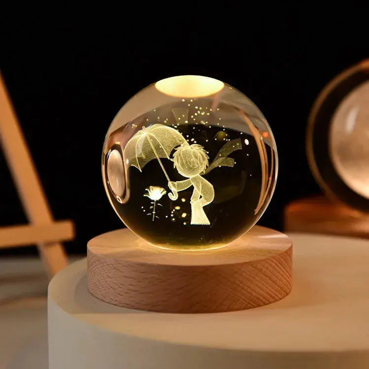 Cosmos 3D galaxy crystal sphere night light on wood base.