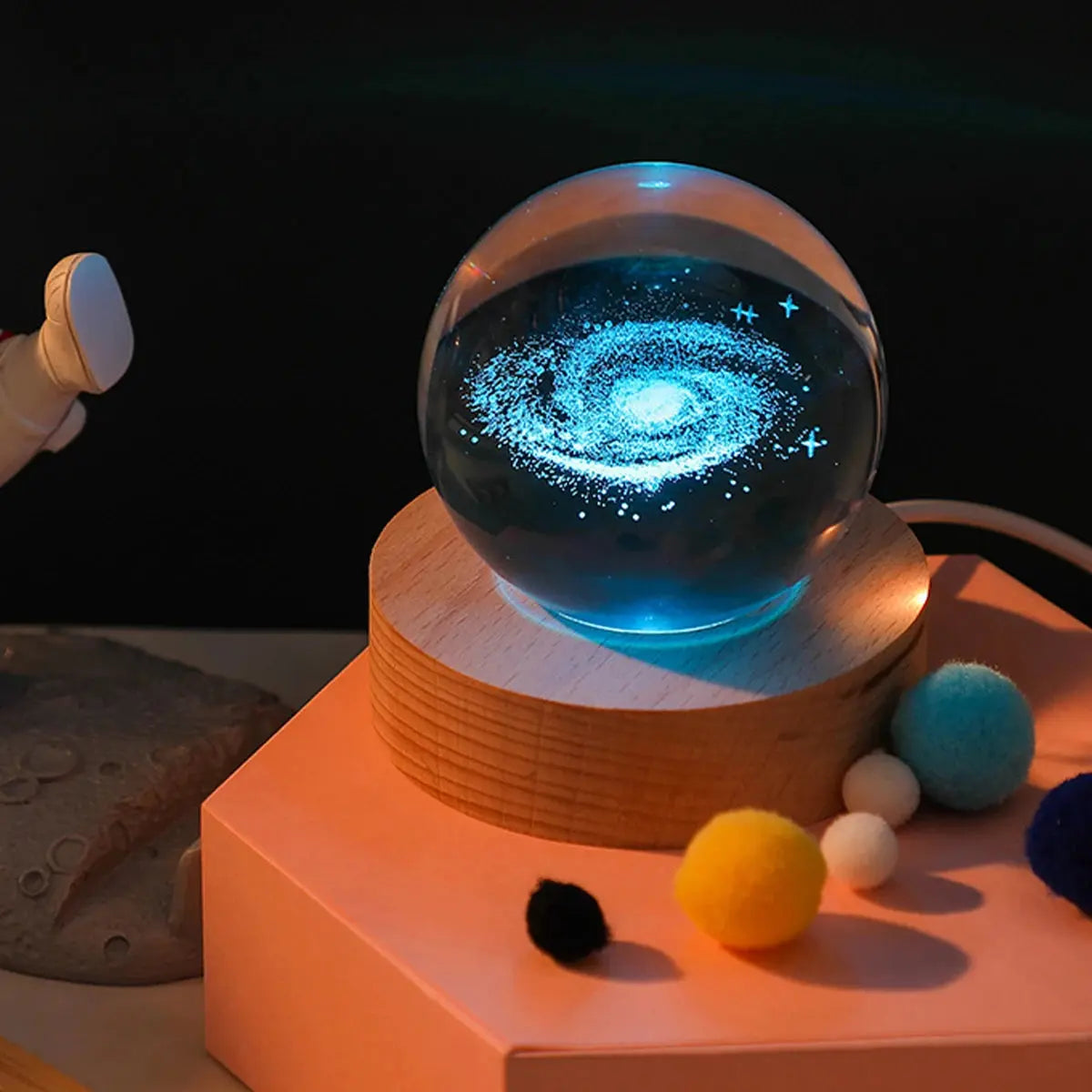 Cosmos 3D galaxy crystal sphere night light on wood base.