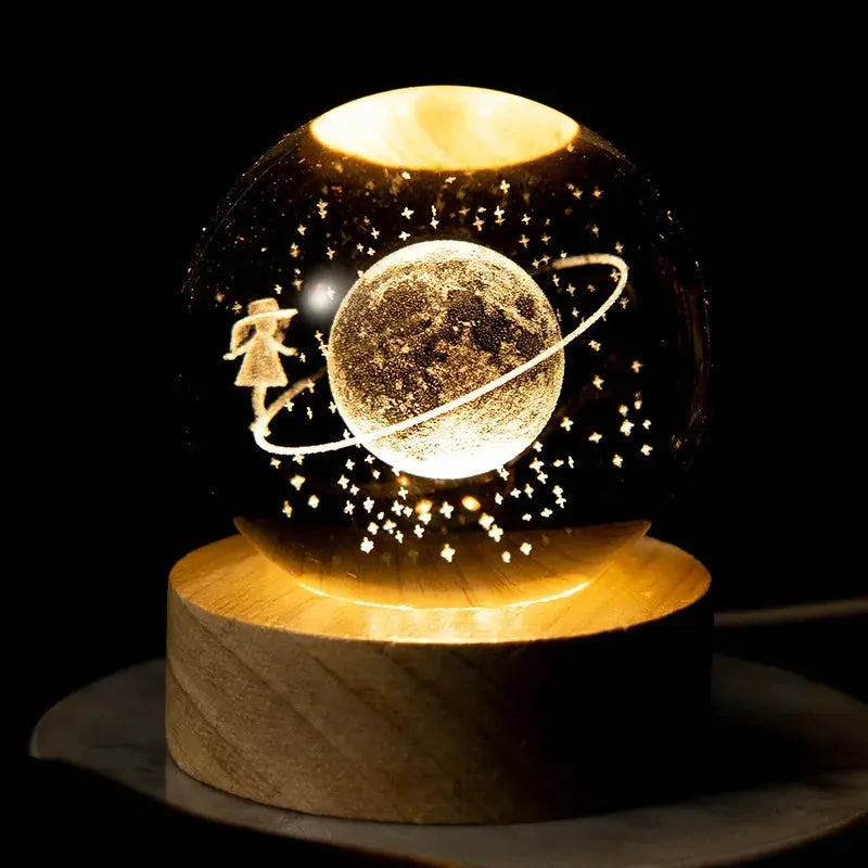 Cosmos 3D galaxy crystal sphere night light on wood base.