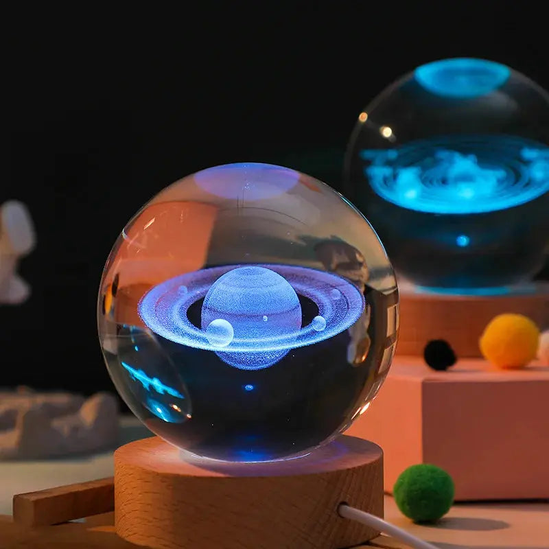 Cosmos 3D galaxy crystal sphere night light on wood base.