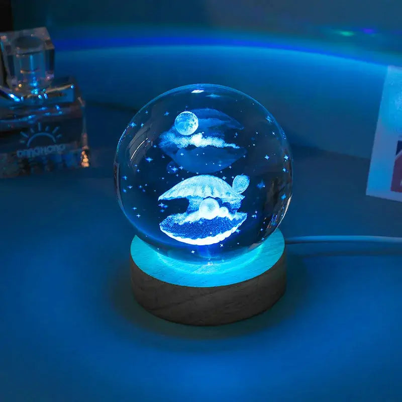 Cosmos 3D galaxy crystal sphere night light on wood base.