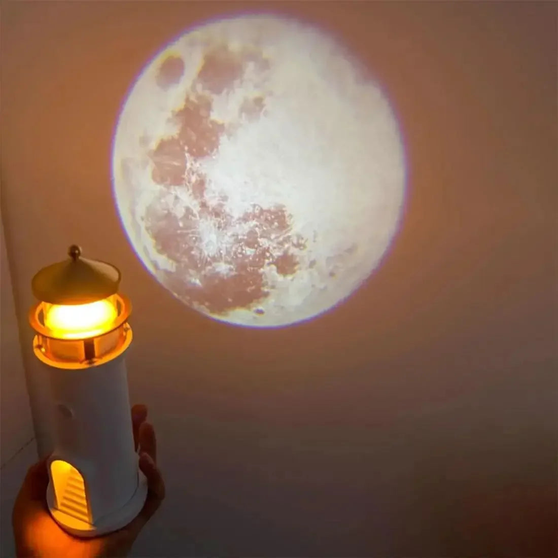 LunaBeacon lighthouse night light projecting a floating moon.