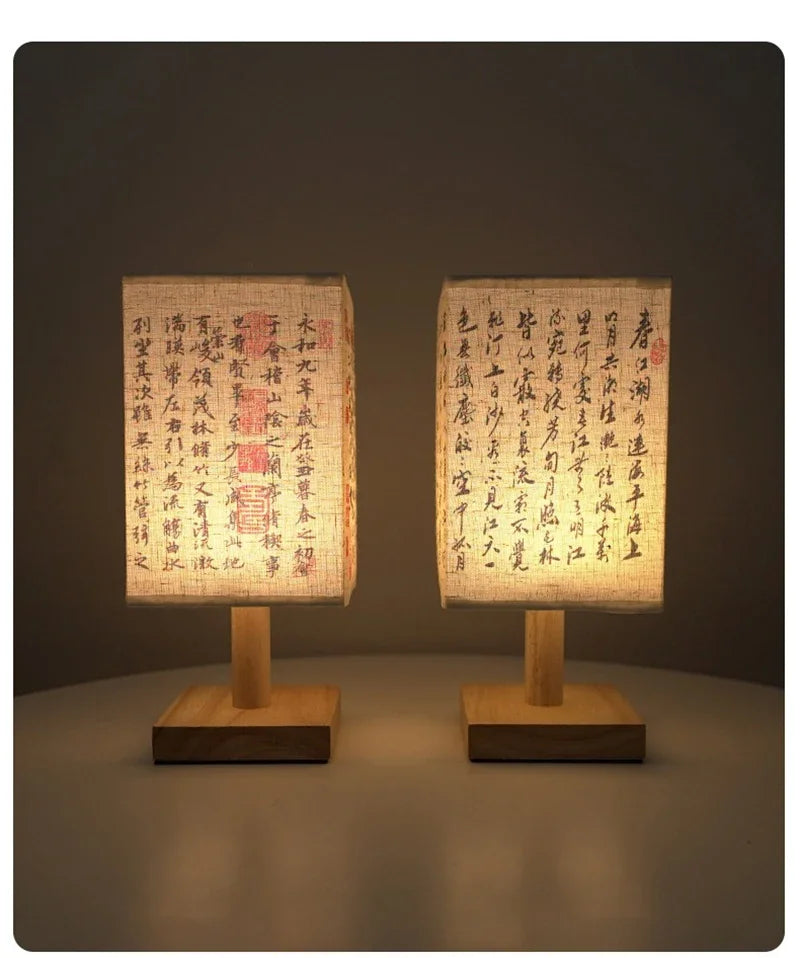Close-up of the SereneScape Artisan Table Lamp's solid wood base and oriental art linen shade, showcasing its handcrafted quality. VelunaLumin.