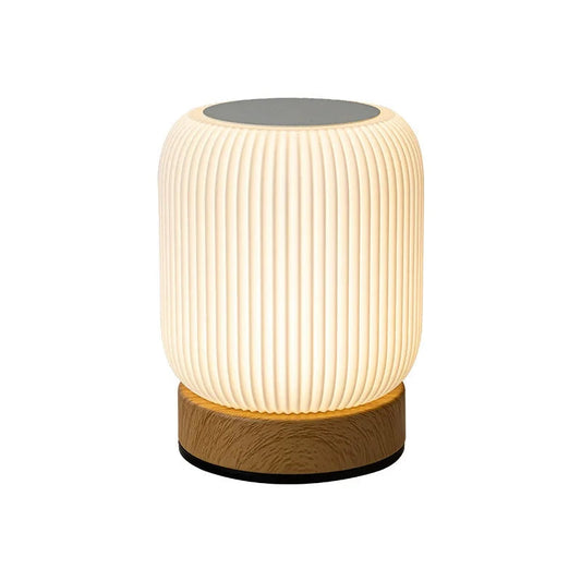 AuraShroom Portable Touch Lamp, a dimmable mushroom-shaped LED night light, in a modern white finish. VelunaLumin.
