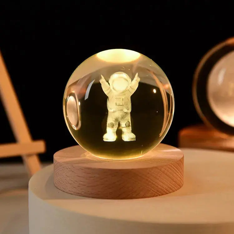 Cosmos 3D galaxy crystal sphere night light on wood base.