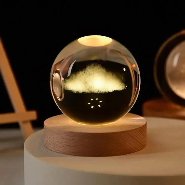 Cosmos 3D galaxy crystal sphere night light on wood base.