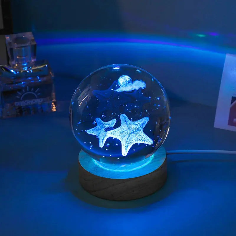 Cosmos 3D galaxy crystal sphere night light on wood base.