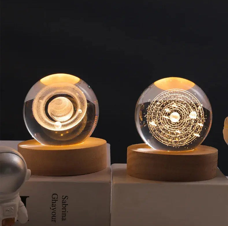 Cosmos 3D galaxy crystal sphere night light on wood base.
