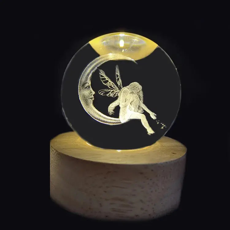 Cosmos 3D galaxy crystal sphere night light on wood base.