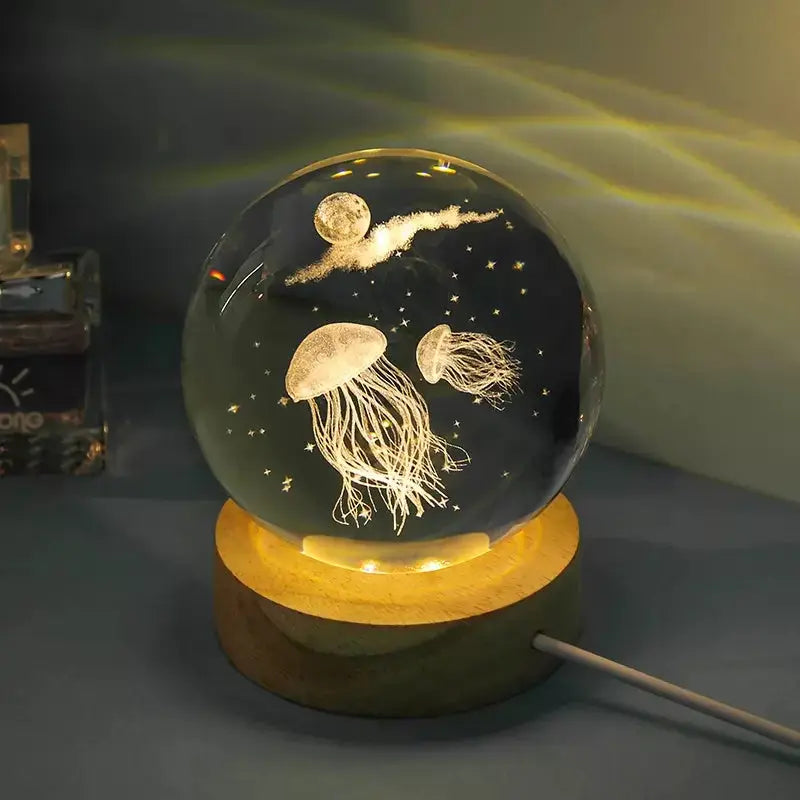 Cosmos 3D galaxy crystal sphere night light on wood base.