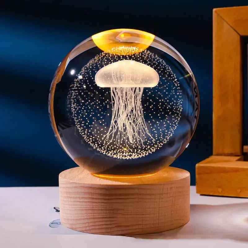 Cosmos 3D galaxy crystal sphere night light on wood base.