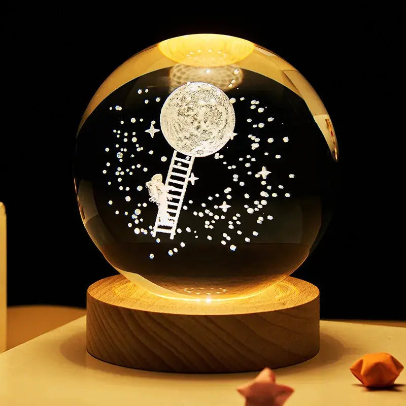 Cosmos 3D galaxy crystal sphere night light on wood base.
