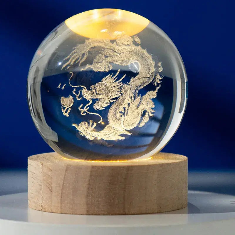 Cosmos 3D galaxy crystal sphere night light on wood base.