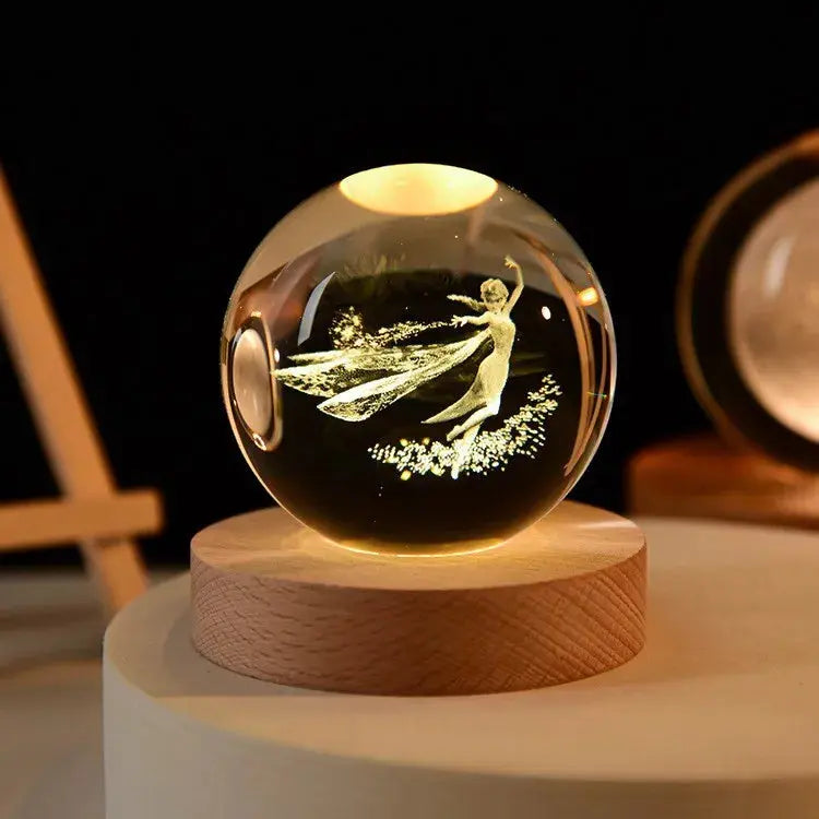 Cosmos 3D galaxy crystal sphere night light on wood base.