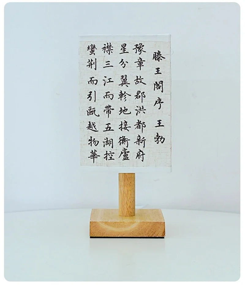 Close-up of the SereneScape Artisan Table Lamp's solid wood base and oriental art linen shade, showcasing its handcrafted quality. VelunaLumin.