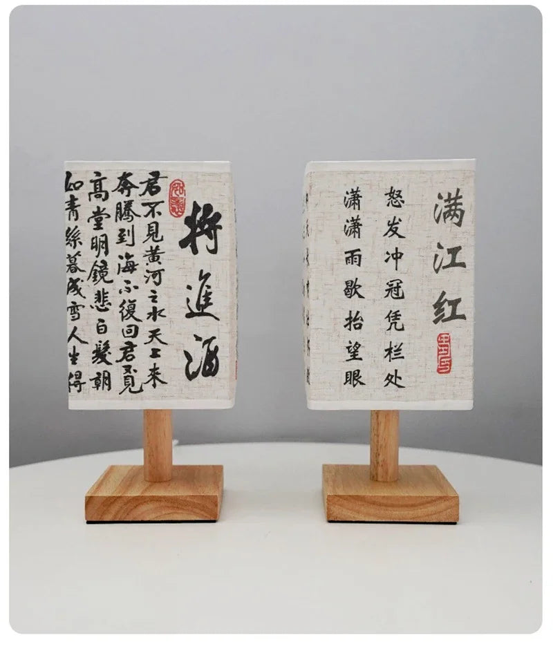 Close-up of the SereneScape Artisan Table Lamp's solid wood base and oriental art linen shade, showcasing its handcrafted quality. VelunaLumin.
