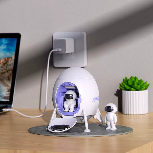 Stargazer astronaut galaxy and nebula projector night light.