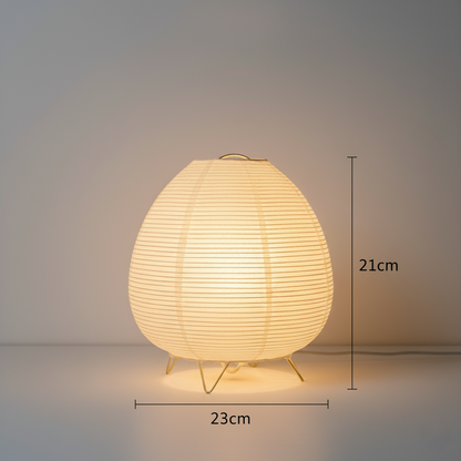 Close-up of the Akari Rice Paper Lamp, showcasing the delicate texture of the handcrafted rice paper shade and its unique, sculptural form. VelunaLumin.
