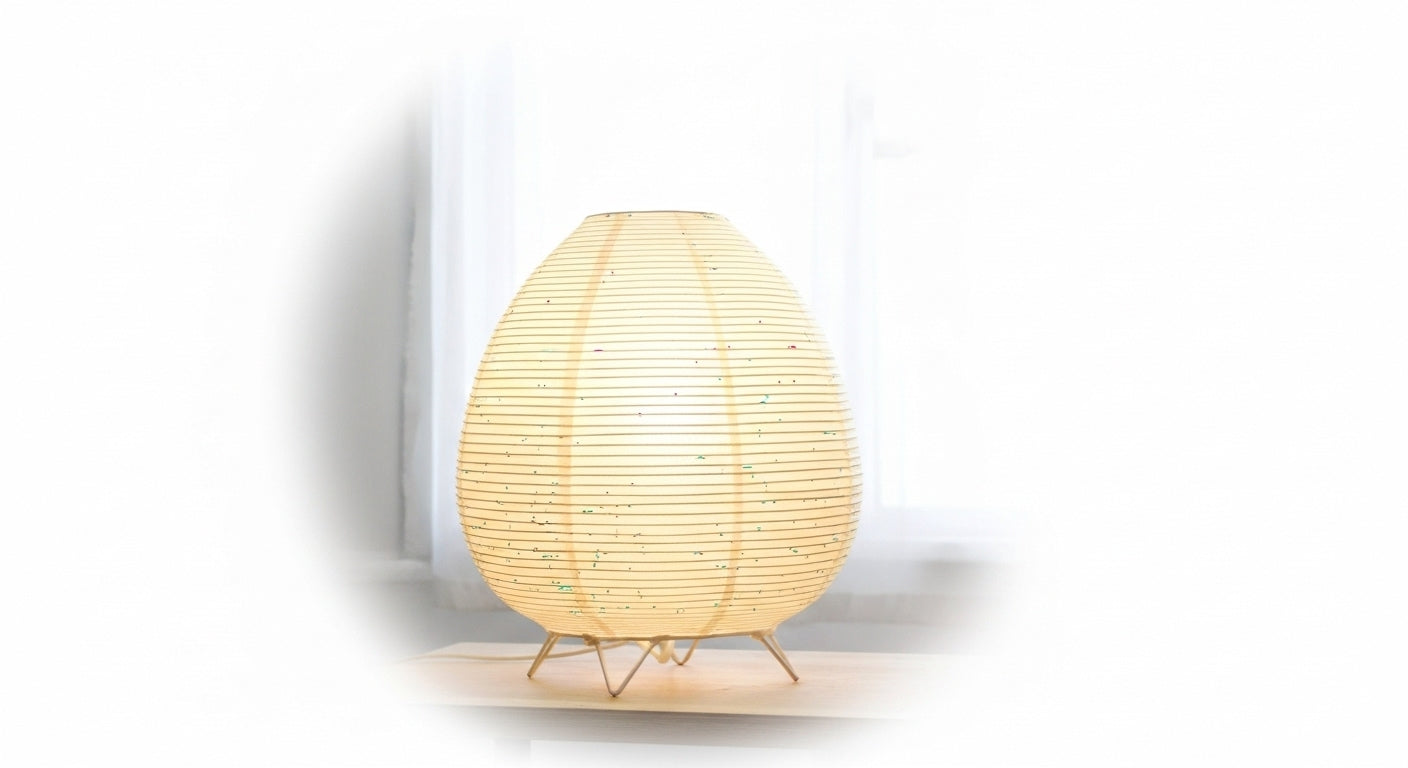 Close-up of the Akari Rice Paper Lamp, showcasing the delicate texture of the handcrafted rice paper shade and its unique, sculptural form. VelunaLumin.