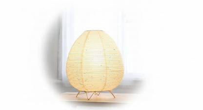 Close-up of the Akari Rice Paper Lamp, showcasing the delicate texture of the handcrafted rice paper shade and its unique, sculptural form. VelunaLumin.