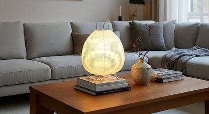 Akari Rice Paper Table Lamp as a decorative centerpiece on a living room side table, adding a touch of minimalist, organic artistry. VelunaLumin.