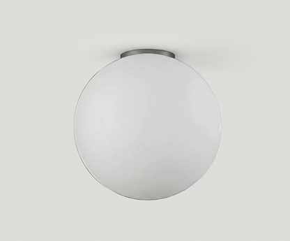 Close-up of the AuraOrb Ceiling Light showing the detail of the frosted glass globe and the premium metal base in a brushed gold finish. VelunaLumin.