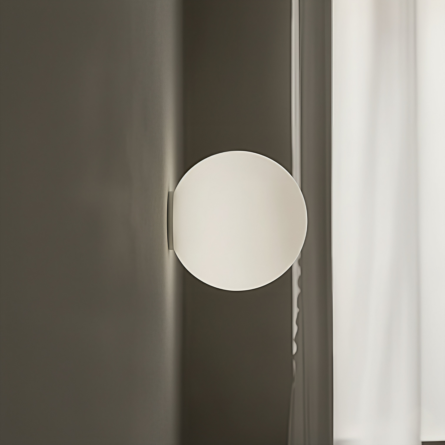 Close-up of the AuraOrb Ceiling Light showing the detail of the frosted glass globe and the premium metal base in a brushed gold finish. VelunaLumin.