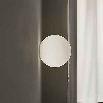 Close-up of the AuraOrb Ceiling Light showing the detail of the frosted glass globe and the premium metal base in a brushed gold finish. VelunaLumin.