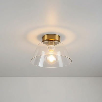 AuraSphere Glass Ceiling Light in a crystal-clear Transparent glass finish, featuring a modern gold base, surface mounted. VelunaLumin.