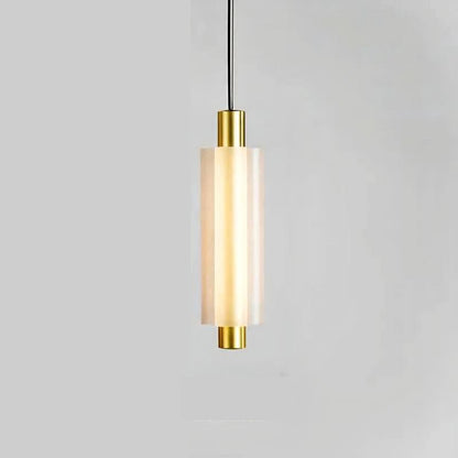 Linea modern long acrylic pendant light as bedside lighting.