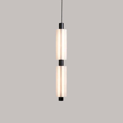 Linea modern long acrylic pendant light as bedside lighting.