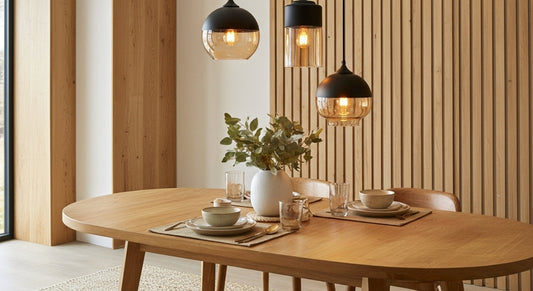 LuminaGrace Rich Amber & Clear Glass Slim Cylinder Pendant Light hanging above a velvet bedside table, casting a warm, intimate glow in a luxurious bedroom setting, VelunaLumin.