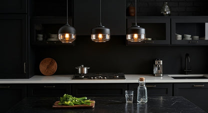 LuminaGrace Rich Amber & Clear Glass Slim Cylinder Pendant Light hanging above a velvet bedside table, casting a warm, intimate glow in a luxurious bedroom setting, VelunaLumin.
