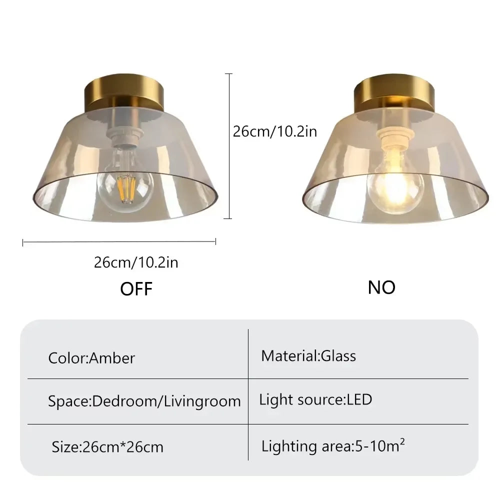 Close-up of the AuraSphere Ceiling Light, showcasing the quality of the hand-blown glass and the premium polished gold metal base. VelunaLumin.