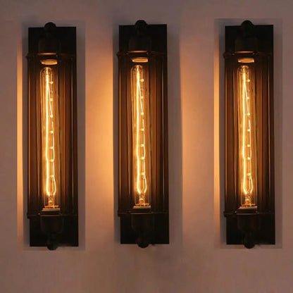 IronGlow Industrial Wall Sconce - Black metal cage design with E27 bulb holder, perfect for vintage industrial lighting. VelunaLumin.