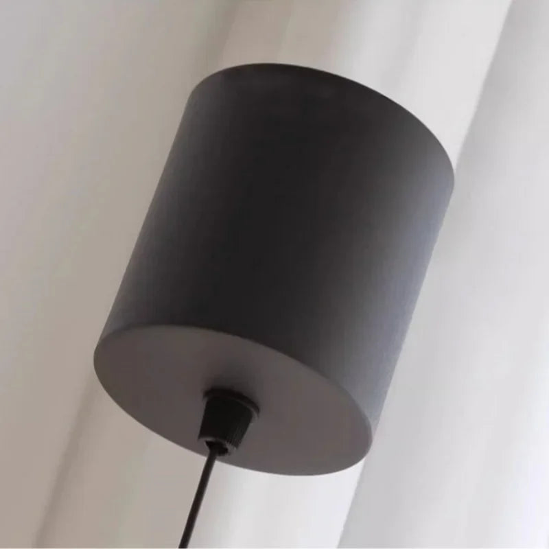 AuraSpire Architectural Pendant Light in a soft Off-White finish, featuring a minimalist aluminum body and optical spotlight lens. VelunaLumin