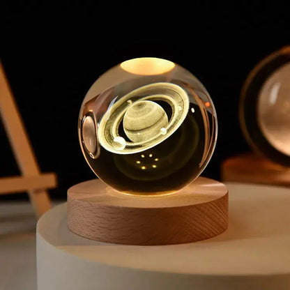Cosmos 3D galaxy crystal sphere night light on wood base.
