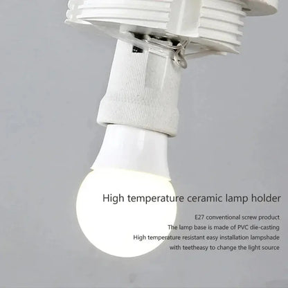 Close-up of the AuraOrb Ceiling Light showing the detail of the frosted glass globe and the premium metal base in a brushed gold finish. VelunaLumin.