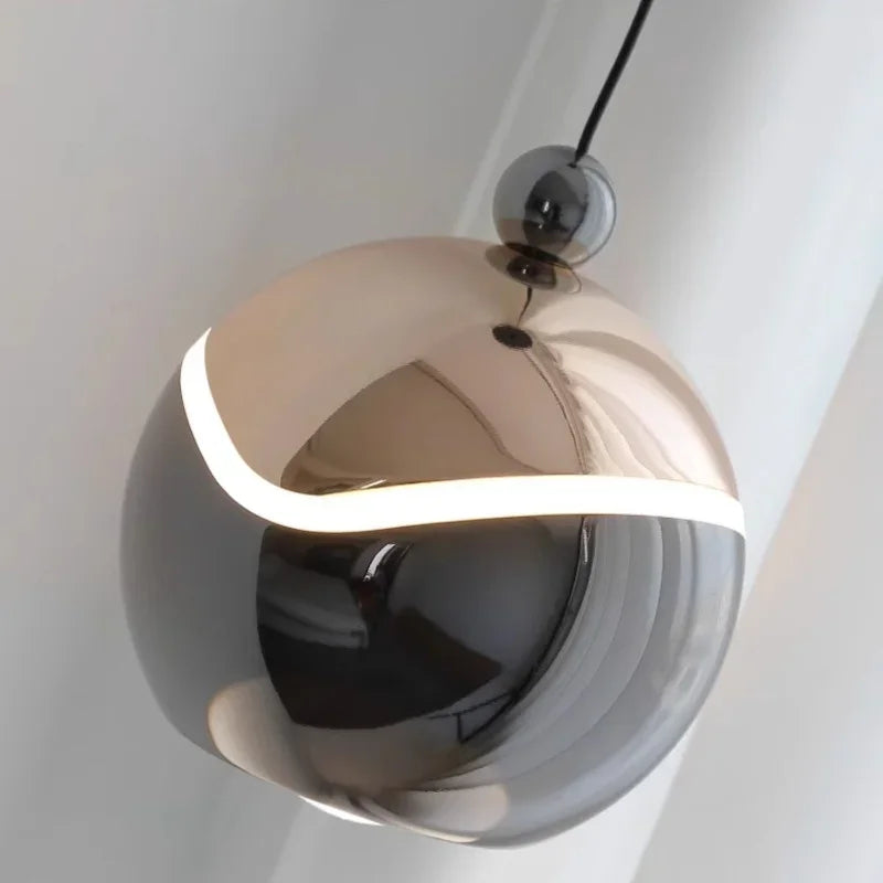 AuraSpire Architectural Pendant Light in a sleek Matte Black finish, featuring a minimalist aluminum body and optical spotlight lens. VelunaLumin