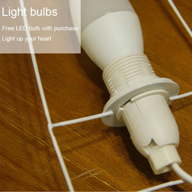 Close-up of the Akari Rice Paper Lamp, showcasing the delicate texture of the handcrafted rice paper shade and its unique, sculptural form. VelunaLumin.