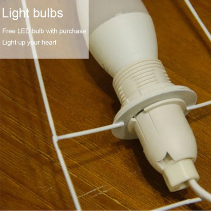 Close-up of the Akari Rice Paper Lamp, showcasing the delicate texture of the handcrafted rice paper shade and its unique, sculptural form. VelunaLumin.