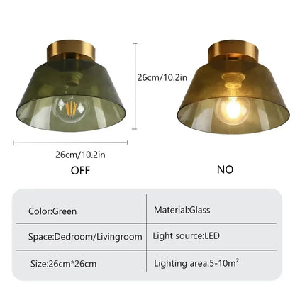 Close-up of the AuraSphere Ceiling Light, showcasing the quality of the hand-blown glass and the premium polished gold metal base. VelunaLumin.