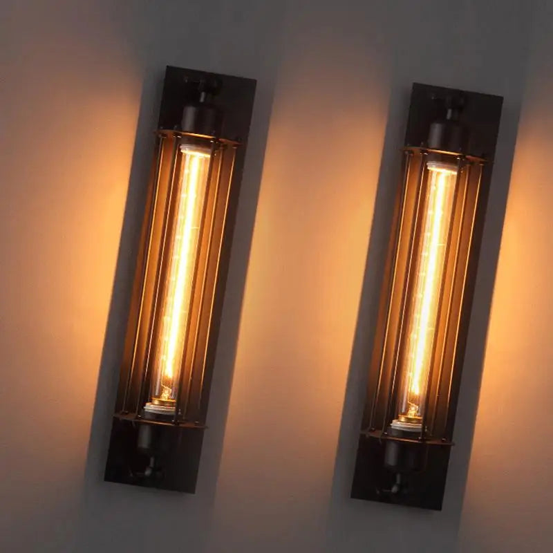 IronGlow Industrial Wall Sconce - Black metal cage design with E27 bulb holder, perfect for vintage industrial lighting. VelunaLumin.