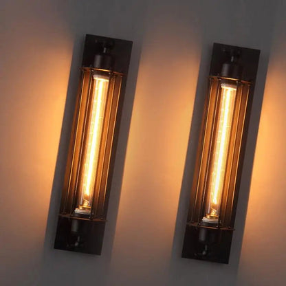 IronGlow Industrial Wall Sconce - Black metal cage design with E27 bulb holder, perfect for vintage industrial lighting. VelunaLumin.