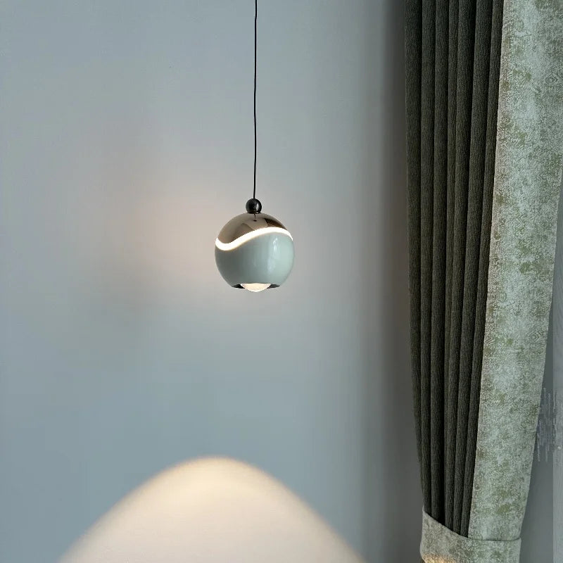 AuraSpire Architectural Pendant Light in a soft Off-White finish, featuring a minimalist aluminum body and optical spotlight lens. VelunaLumin