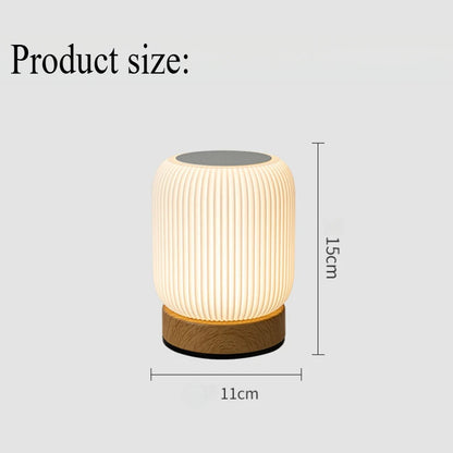 AuraShroom Portable Touch Lamp, a dimmable mushroom-shaped LED night light, in a modern white finish. VelunaLumin.