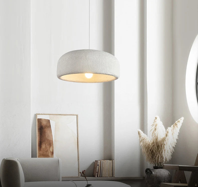 ZenGlow Organic Pendant Light hanging elegantly over a minimalist dining table, casting a soft, diffused ambient light, creating a tranquil Japanese-inspired atmosphere, VelunaLumin.