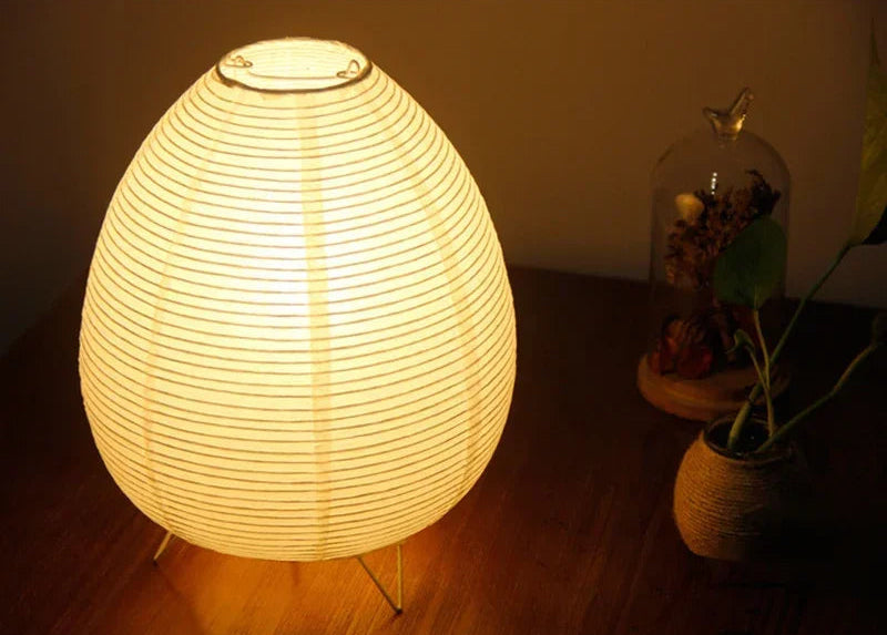 Close-up of the Akari Rice Paper Lamp, showcasing the delicate texture of the handcrafted rice paper shade and its unique, sculptural form. VelunaLumin.