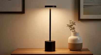 Atelier rechargeable metal touch lamp in gold finish.